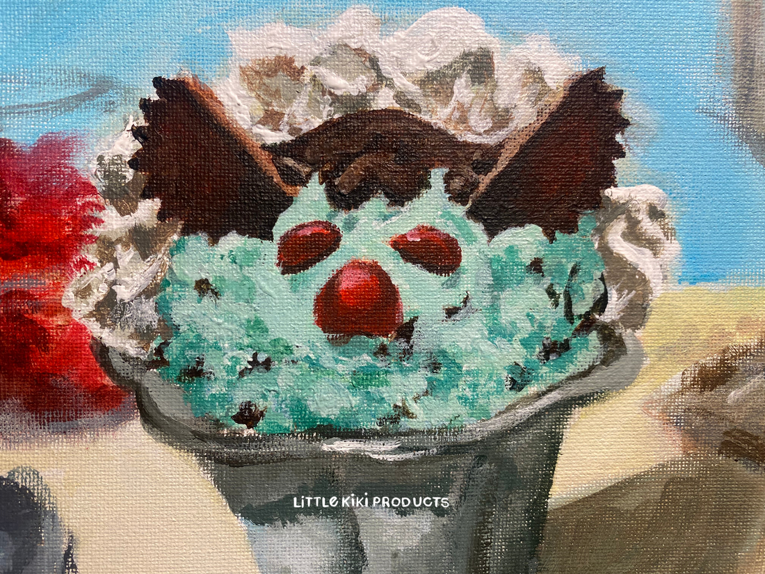 Painting of an ice cream sundae, resembling the Friendly’s “monster mash” mint chocolate chip ice cream sundae with two red M&M eyes, a red cherry nose, and Reese’s cups ears. At the bottom of the painting reads a watermark “little Kiki products”.